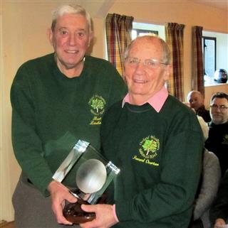 Bert presents Howard with the Bill Alston trophy
